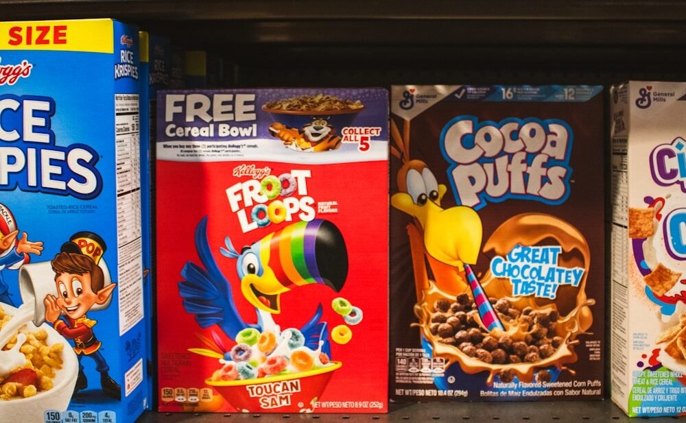 Cereal boxes displayed on a supermarket shelf