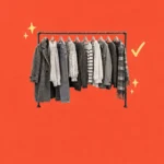 Illustration of a clothing rail of fall garments with a yellow checkmark