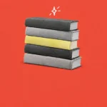 Stack of black-and-white books with one yellow spine on a coral background